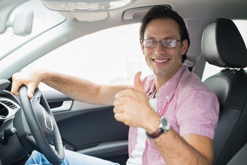 Man smiling while driving