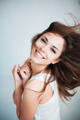 Obraz premium The young girl happily laughs