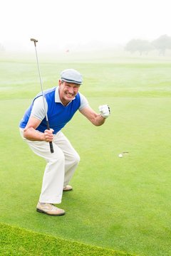 Happy Golfer Cheering On Putting Green