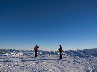 Men in the mountains in winter.