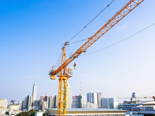 Fototapeta na wymiar construction crane on blue sky