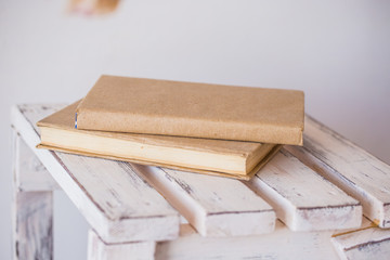 Vintage old books on wooden deck