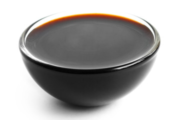 Soja sauce in small glass dish. Isolated on white. © Moving Moment