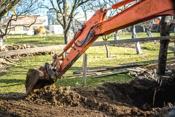 Track-type loader excavator machinery on construction site