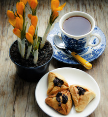Tea with pastry and crocus