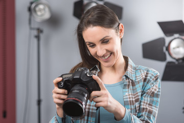 Photographer posing in a professional studio