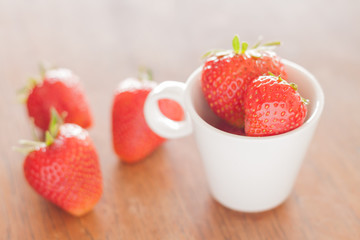 Fresh strawberries on wooden table