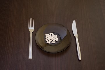 Pills on plate