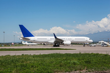 Fototapeta na wymiar Passengers airplane on the airport.