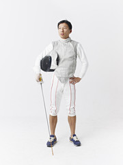 portrait of a male asian fencer