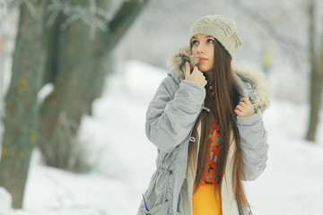 glamorous winter portrait of a girl outside