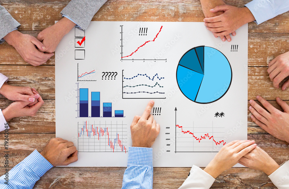 Canvas Prints close up of business team with charts at table