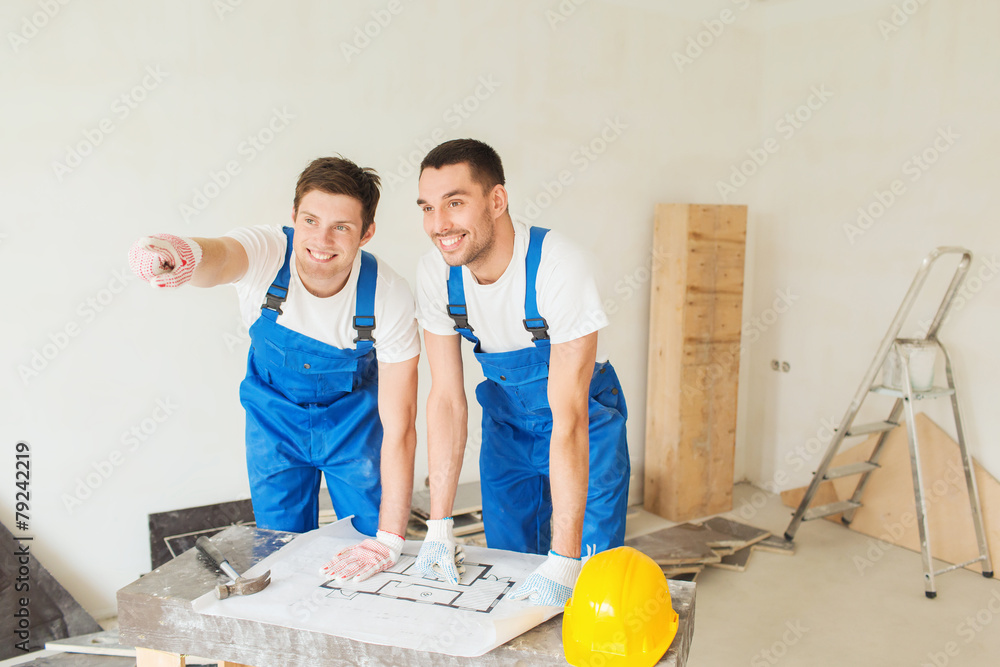 Sticker group of builders with blueprint