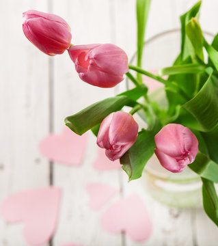 Pink tulips in vase close up image