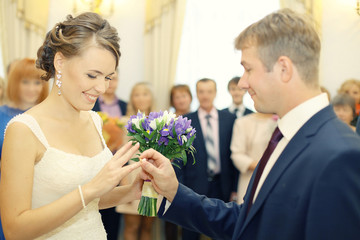 Portrait of the bride at a wedding in a white dress