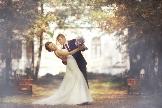 bride and groom in autumn park Love Life