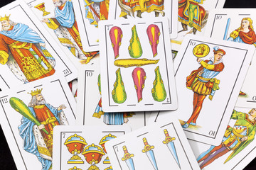 Spanish cards in black background