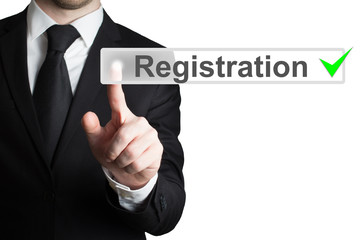 businessman pressing button registration isolated