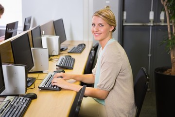 Student working on computer in classroom