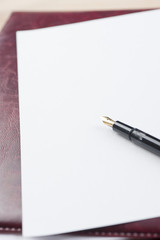 pen and blank A4 paper