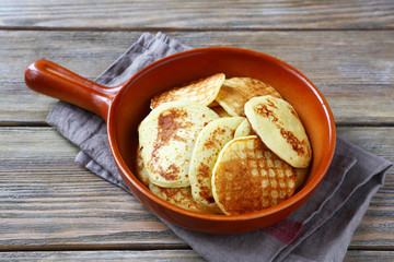 Light pancakes on a ceramic pan