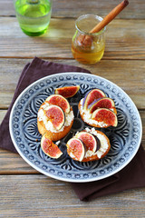 Bruschetta with cheese, figs and honey