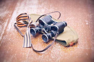 Military binoculars, soldier field cap, George Ribbon