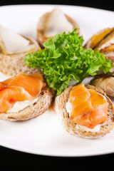 Sandwiches with salmon and halibut.