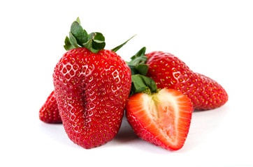 Strawberries with leaves. Isolated on a white background.