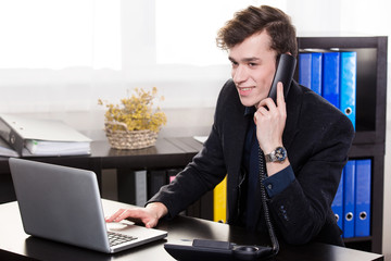 business man call someone