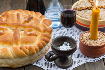 Johnny-cake with candle and red wine