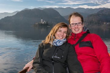 Happy couple in a boat.