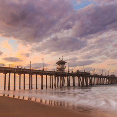 the Huntington Beach pier at sunrise