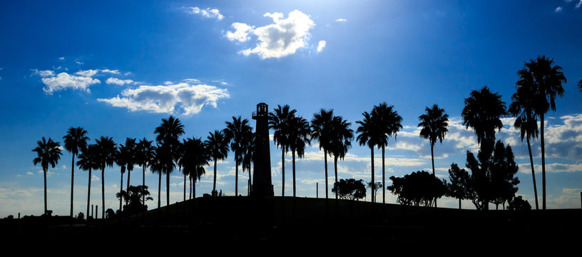 Long Beach California With Shoreline Palm Trees And Lighthouse