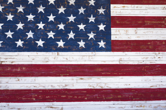 Painted American flag onn wooden wall