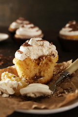 Delicious cupcakes on table close-up