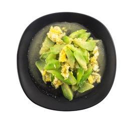 Top view  of stir fried angled gourd with eggs