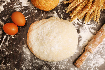 Making bread on wooden table background