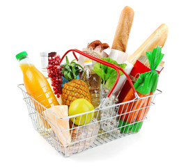 Metal shopping basket with groceries isolated on white