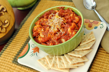 Bowl of chili and crackers                           