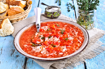 Soup with rice, vegetables and thyme