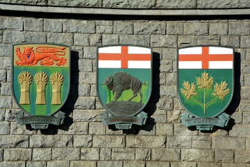 Coats of arms of Canadian provinces displayed on wall