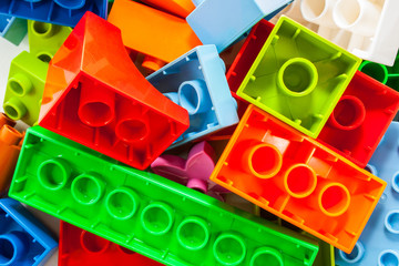 Naklejka premium Color plastic toy blocks.