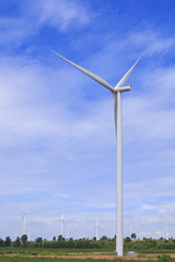 Fototapeta premium Wind Turbine for alternative energy on background blue sky .