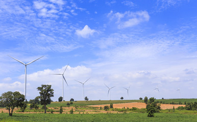Fototapeta na wymiar Wind Turbine for alternative energy on background blue sky .
