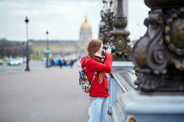 Young tourist in Paris on the Pont Alexandre III