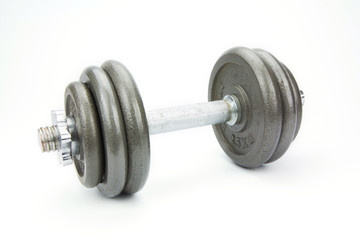 Naklejka premium dumbbells over white background