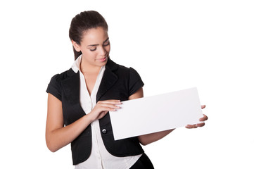 Happy young woman holds blank card - copyspace