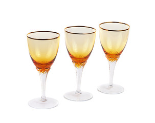 Three empty wine glasses