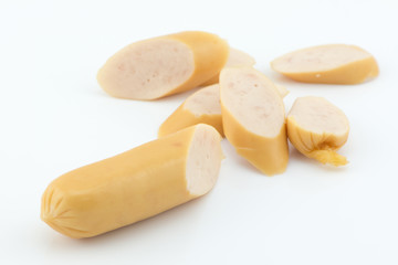 Sausage cut by slices on a white background